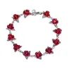 Bracciale in oro e argento con rose rosse