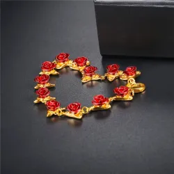 Pulseira de ouro e prata com rosas vermelhas