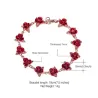 Pulseira de ouro e prata com rosas vermelhas