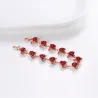 Pulseira de ouro e prata com rosas vermelhas