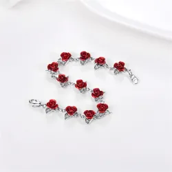 Bracciale in oro e argento con rose rosse