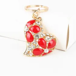 Crystal-sydän punaisilla kukilla - keychain