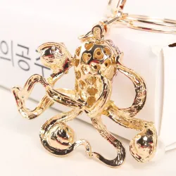 Crystal vaaleanpunainen oktopus & helmiä - keychain