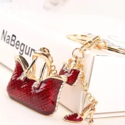 Two crystal red bags & high-heeled shoe - keychain