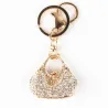llaveroBolso de cristal con corazón - llavero