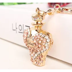 Bouteille de parfum en cristal d'or - porte-clés