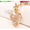 Bouteille de parfum en cristal d'or - porte-clés