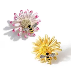 Abe de cristal et marguerite - une broche élégante